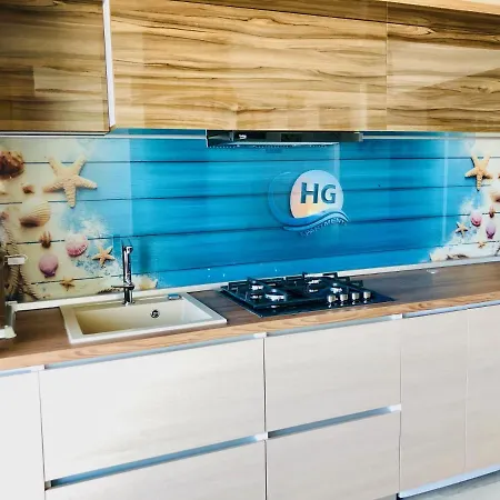 Hg *